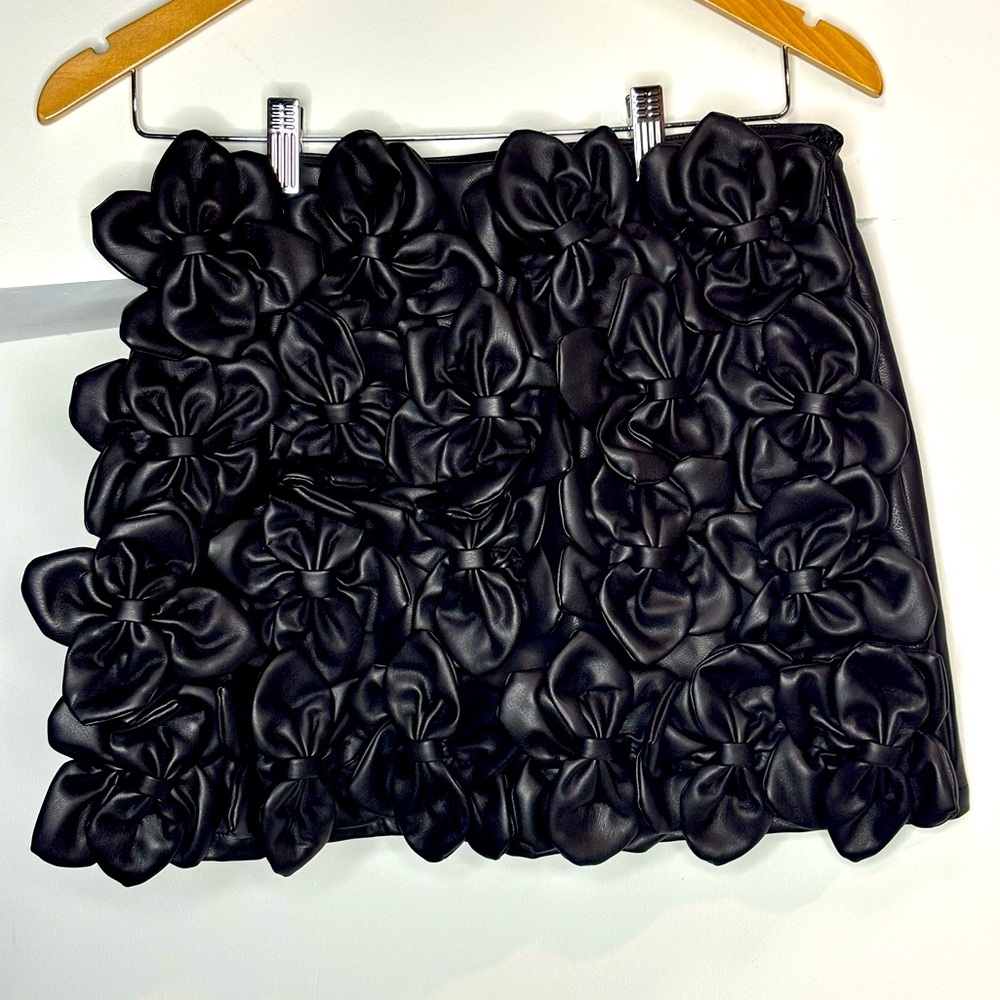 Vegan leather skirt with handmade bow detail